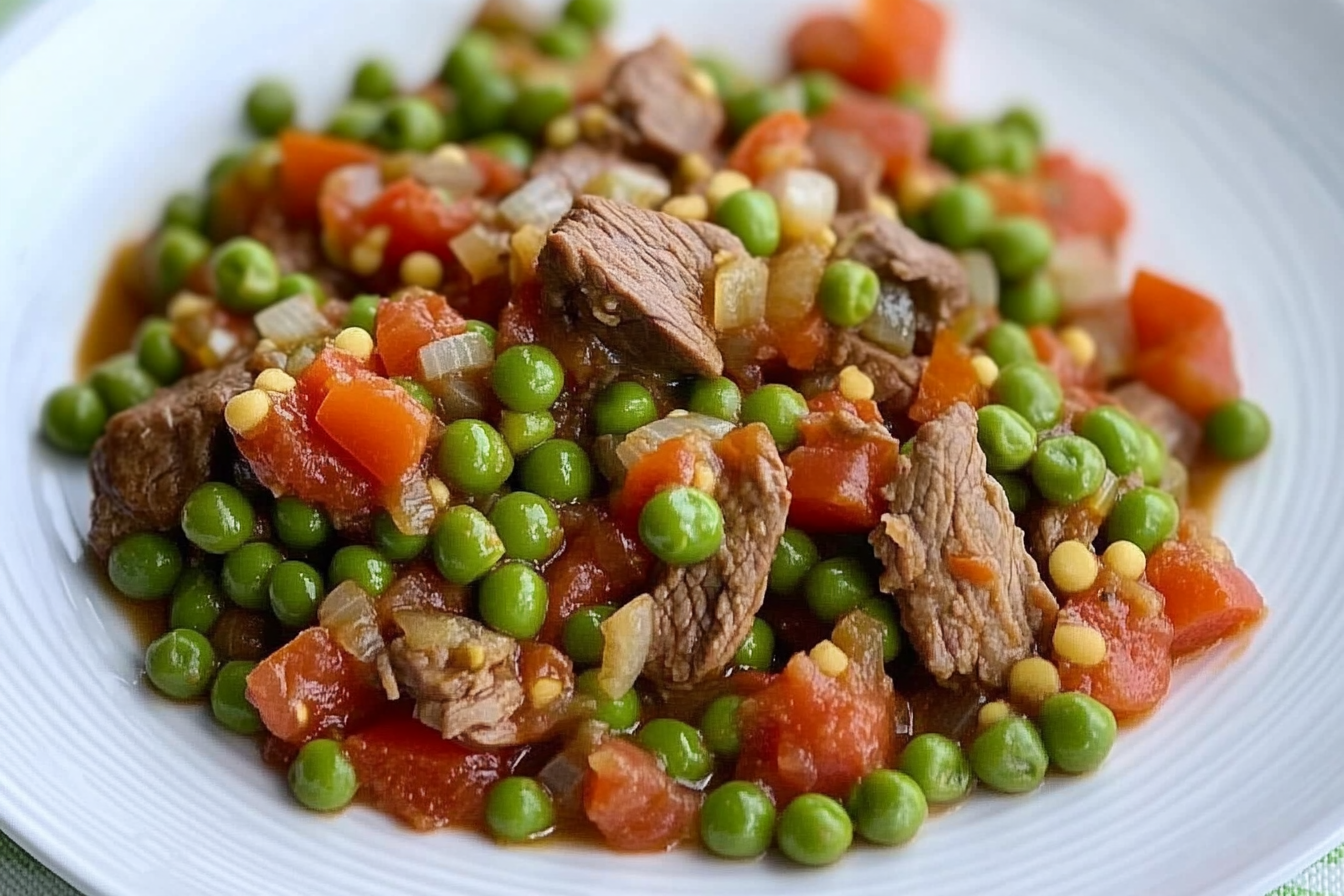 Guisantes con tomate y ternera