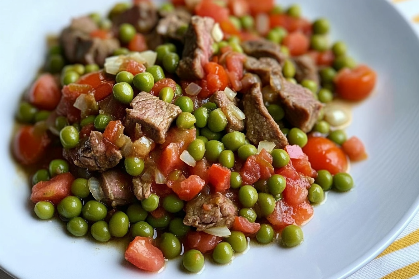 Guisantes con tomate y ternera